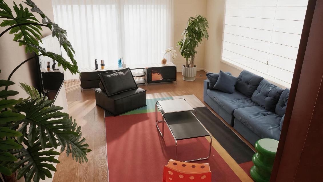 Studio lounge: blue sofa and red rug