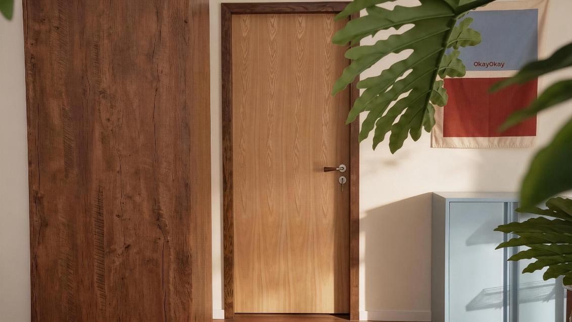 Studio set: solid oak door in a wood-panelled wall, with plants